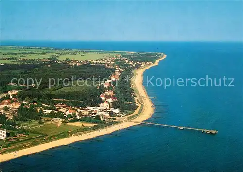 AK / Ansichtskarte Kuehlungsborn Ostseebad mit Seebruecke Fliegeraufnahme Kat. Kuehlungsborn