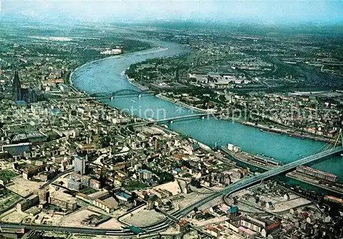 AK / Ansichtskarte Koeln Rhein Stadtblick mit Rheinlauf und Dom Fliegeraufnahme Kat. Koeln