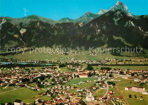 AK / Ansichtskarte Reutte Tirol Fliegeraufnahme mit Hahnenkamm Titzl Schneid Gehrenspitze Reutte Tirol Kat. Reutte