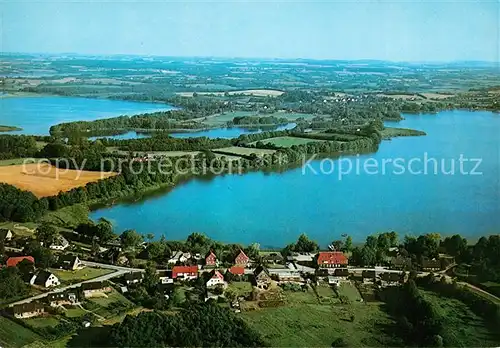 AK / Ansichtskarte Niederkleveez Fliegeraufnahme Langensee Behler See Timmendorf Niederkleveez