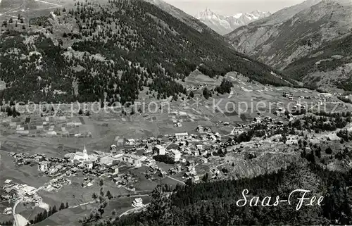 AK / Ansichtskarte Saas Fee Fliegeraufnahme gegen Bietschhorn Saas Fee