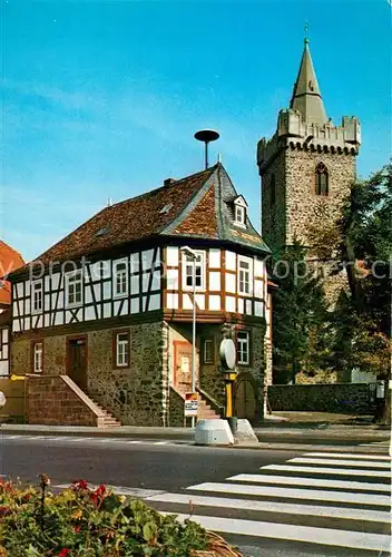 AK / Ansichtskarte Bruchkoebel Altes Rathaus und Kirche Bruchkoebel