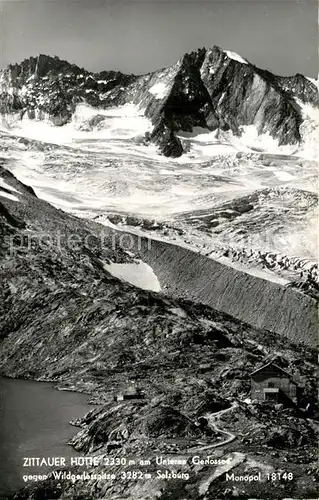 AK / Ansichtskarte Zittauerhuette Unterer Gerlossee gegen Wildgerlosspitze Gletscher Gebirgspanorama Zillertaler Alpen Zittauerhuette