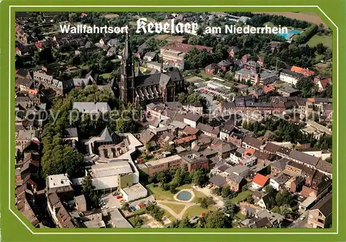 AK / Ansichtskarte Kevelaer Wallfahrtsort am Niederrhein Stadtzentrum Kirche Fliegeraufnahme Kevelaer