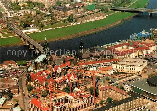 AK / Ansichtskarte Dresden Augustusbruecke Hofkirche Schloss Verkehrsmuseum Hotel Dresden Hilton Fliegeraufnahme Dresden