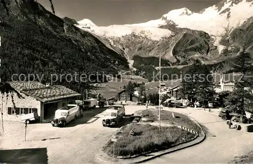 AK / Ansichtskarte Saas Fee Auto Post Parkplatz Allalinhorn Alphubel Saas Fee