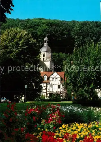 AK / Ansichtskarte Bad_Sooden Allendorf Rhenanusplatz St Marienkirche Park Blumenbeet Bad_Sooden Allendorf