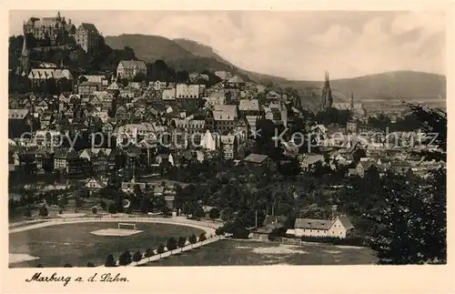 AK / Ansichtskarte Marburg_Lahn Stadtbild mit Sportstadion Altstadt Kirche Schloss Marburg_Lahn