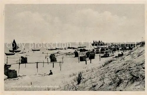 AK / Ansichtskarte Ahlbeck_Ostseebad Strand mit Seebruecke Ahlbeck_Ostseebad