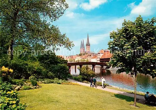 AK / Ansichtskarte Luebeck Uferpromenade an der Trave Bruecke Kirche Luebeck