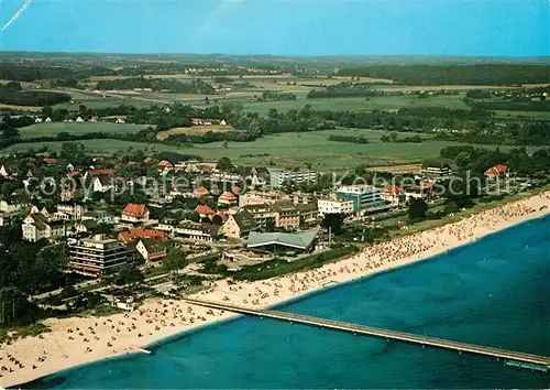 AK / Ansichtskarte Scharbeutz_Ostseebad Fliegeraufnahme Seebruecke Meerwasserwellenbad Scharbeutz_Ostseebad