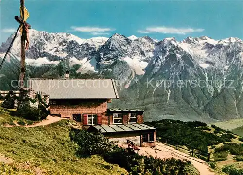 AK / Ansichtskarte Garmisch Partenkirchen Wankhaus Gipfelkreuz gegen Karwendel Alpenpanorama Garmisch Partenkirchen