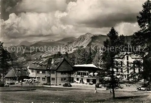 AK / Ansichtskarte Valberg Un coin du village et la Chaine des Alpes Valberg