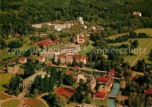 AK / Ansichtskarte Bad_Brueckenau Fliegeraufnahme Kurpark Hartwald Kurklinik Regena Sanatorium Bad_Brueckenau