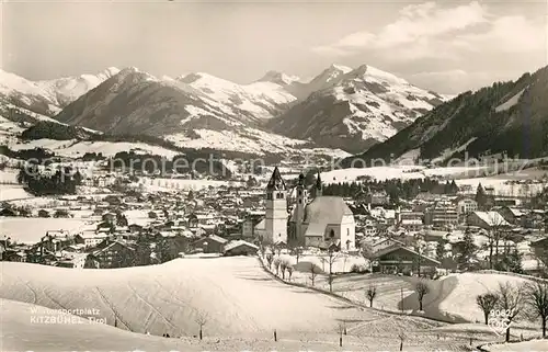 AK / Ansichtskarte Kitzbuehel_Tirol Gesamtansicht Wintersportplatz mit Alpenpanorama Kitzbuehel Tirol