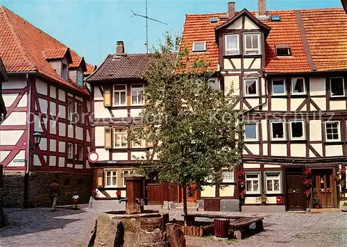 AK / Ansichtskarte Alsfeld Brunnen Fachwerkhaeuser Altstadt Alsfeld