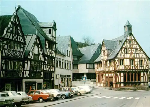 AK / Ansichtskarte Rhens Rathaus Drei alte Haeuser Fachwerkhaeuser Rhens