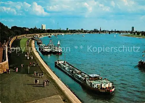 AK / Ansichtskarte Duesseldorf Blick von der Theodor Heuss Bruecke Rheinpromenade Frachtkahn Binnenschifffahrt Duesseldorf