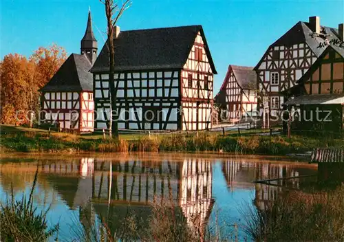 AK / Ansichtskarte Neu Anspach Freilichtmuseum Hessenpark Fachwerkhaeuser Teich Neu Anspach