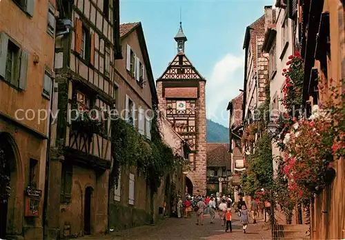 AK / Ansichtskarte Riquewihr_Haut_Rhin La Grand Rue fleurie au fond le Dolder Riquewihr_Haut_Rhin