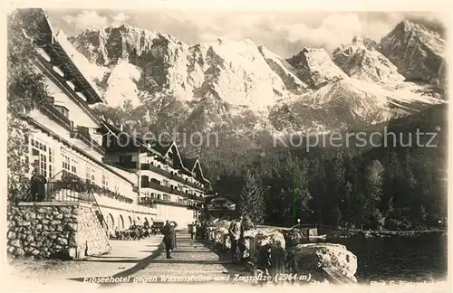 AK / Ansichtskarte Grainau Eibseehotel gegen Waxensteine und Zugspitze Wettersteingebirge Grainau