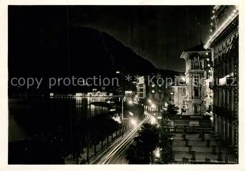 AK / Ansichtskarte Lugano_TI Quai e Monte S. Salvatore nachts Lugano_TI