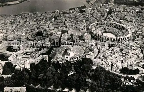 AK / Ansichtskarte Arles_Bouches du Rhone Les Arenes Theatre Cathedrale Saint Trophime et le Rhone vue aerienne Arles_Bouches du Rhone