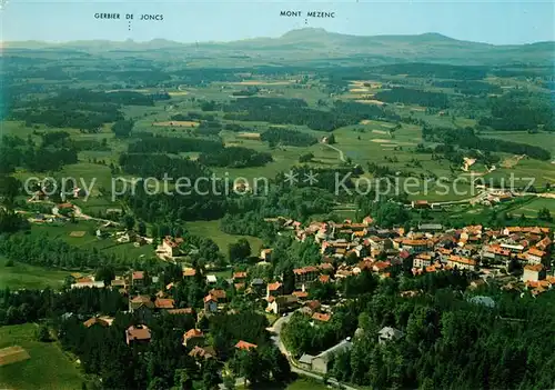 AK / Ansichtskarte Le_Chambon sur Lignon La ville et la chaine des Cevennes vue aerienne Le_Chambon sur Lignon