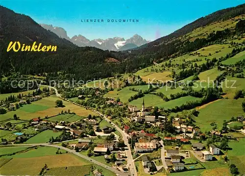 AK / Ansichtskarte Winklern_Moelltal Fliegeraufnahme mit Grossglockner Hochalpenstrasse und Iselsberg Winklern_Moelltal