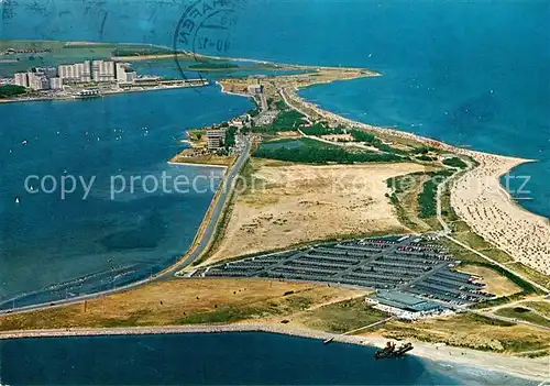 AK / Ansichtskarte Heiligenhafen_Ostseebad Binnensee Halbinsel Steinwarder und Ferienzentrum Fliegeraufnahme Heiligenhafen_Ostseebad