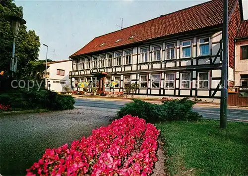 AK / Ansichtskarte Walkenried Hotel Zum goldenen Loewen Fachwerkhaus Blumenbeet Walkenried