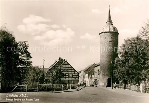 AK / Ansichtskarte Luckau_Niederlausitz Lange Strasse Roter Turm Luckau_Niederlausitz