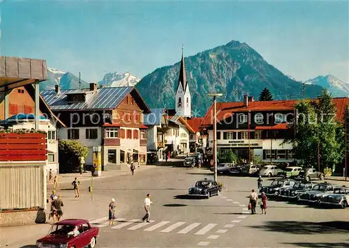 AK / Ansichtskarte Oberstdorf Bahnhofsplatz mit Kratzer Oberstdorf