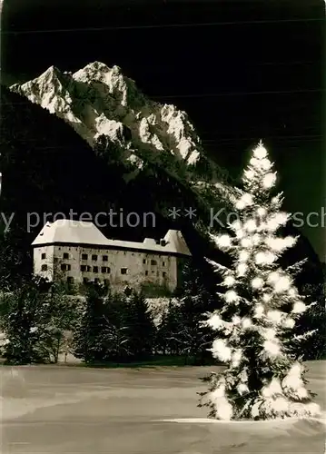 AK / Ansichtskarte Piding Schloss Staufeneck mit Hochstaufen Christbaum Nachtaufnahme Piding