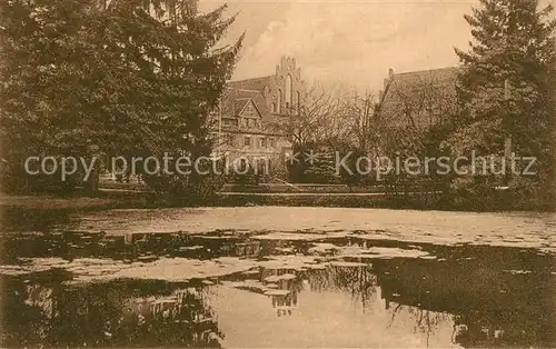 AK / Ansichtskarte Heiligengrabe Stift Abtei mit Kirche Teich Heiligengrabe