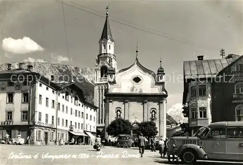 AK / Ansichtskarte Cortina_d_Ampezzo Piazza Roma Chiesa Cortina_d_Ampezzo