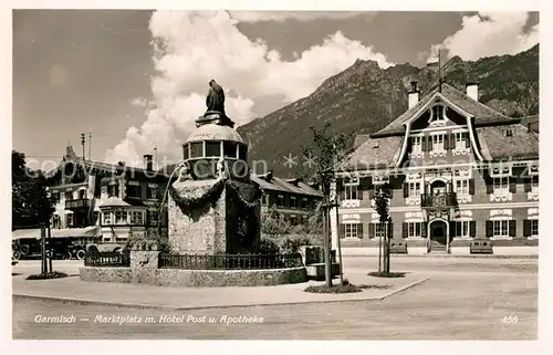 AK / Ansichtskarte Garmisch Partenkirchen Marktplatz Hotel Post Apotheke Denkmal Garmisch Partenkirchen