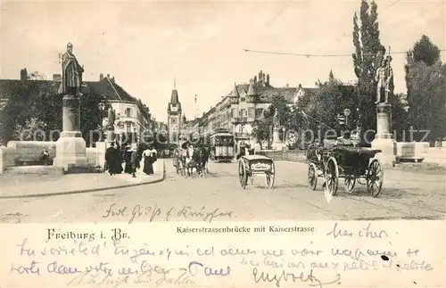 AK / Ansichtskarte Freiburg_Breisgau Kaiserstrasse Bruecke Statue Martinstor Pferdekutschen Strassenbahn Freiburg Breisgau