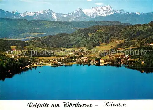 AK / Ansichtskarte Reifnitz_Woerthersee gegen Mittagskogel Karawanken Fliegeraufnahme Reifnitz Woerthersee