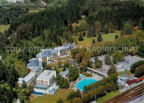 AK / Ansichtskarte Warmbad_Villach Kurhotels mit Thermalfreibad Fliegeraufnahme Warmbad_Villach