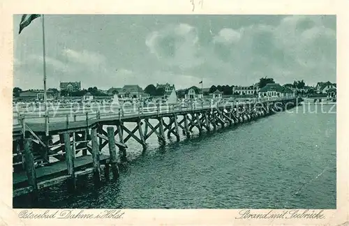 AK / Ansichtskarte Dahme_Ostseebad_Holstein Strand mit Seebruecke 