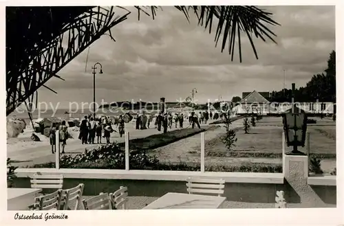 AK / Ansichtskarte Groemitz_Ostseebad Strand Promenade Groemitz_Ostseebad