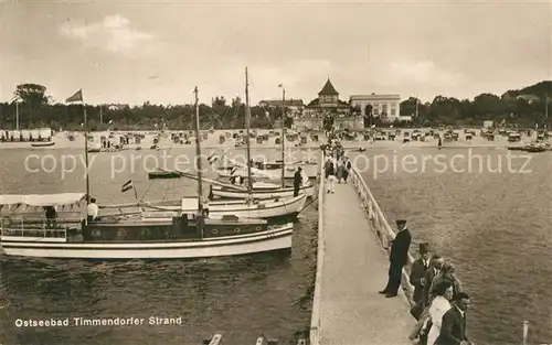 AK / Ansichtskarte Timmendorfer_Strand Bootssteg Strand Timmendorfer_Strand