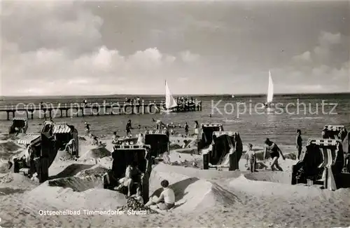 AK / Ansichtskarte Timmendorfer_Strand Strand und Seebruecke Timmendorfer_Strand