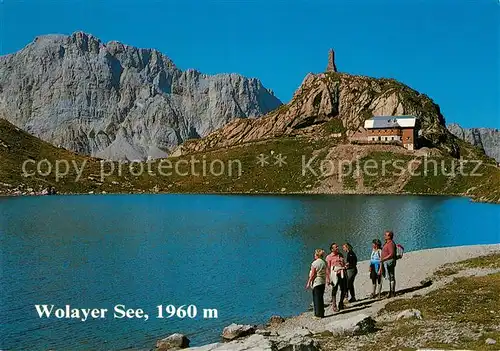 AK / Ansichtskarte Mauthen Wolayer See Bergsee Berghuette mit Biegengebirge Mauthen