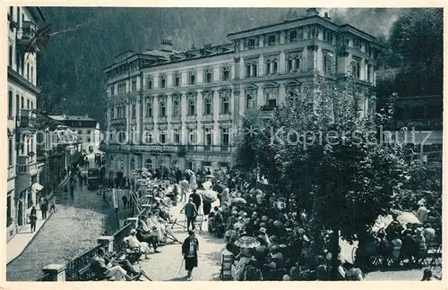 AK / Ansichtskarte Badgastein Kurmusikplatz mit Hauptstrasse Badgastein