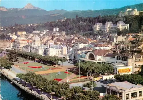 AK / Ansichtskarte Evian les Bains_Haute_Savoie Vue aerienne les Quais du Leman le Casino et ses Jardins la Ville et la Dent d Oche Evian les Bains_Haute