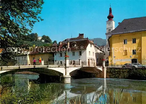 AK / Ansichtskarte Wolfsberg_Kaernten Partie an der Lavant Bruecke Blick zur Kirche Wolfsberg Kaernten