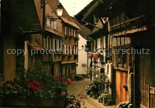 AK / Ansichtskarte Eguisheim_Haut_Rhin Etroite ruelle bordee de maisons alsaciennes Eguisheim_Haut_Rhin