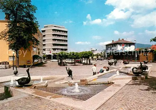 AK / Ansichtskarte Gaggenau Bahnhofsplatz mit Brunnen Gaggenau